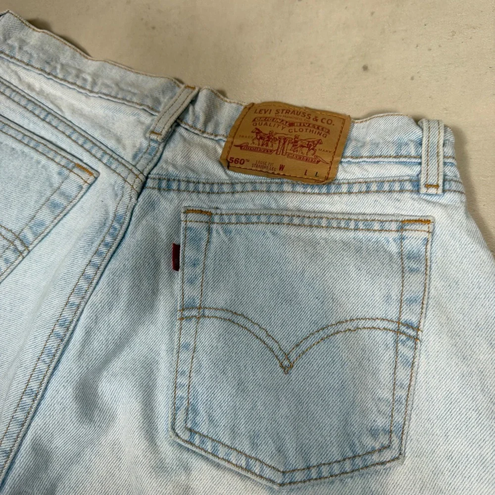 Vintage Levis 560 Light Wash Cut Off Denim Shorts Womens 13 Long Made in USA